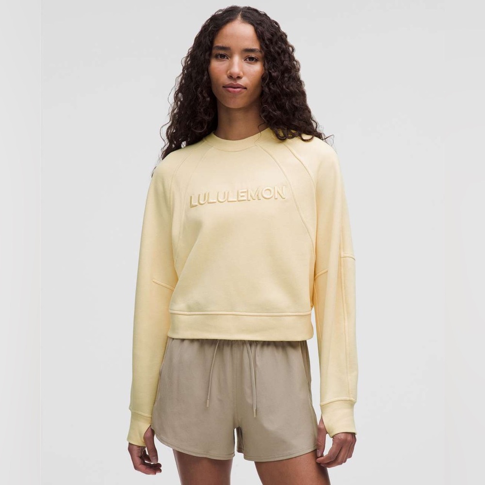 Lululemon Scuba Oversized Crewneck Pullover Wordmark Buttercream XL/XXL NWT